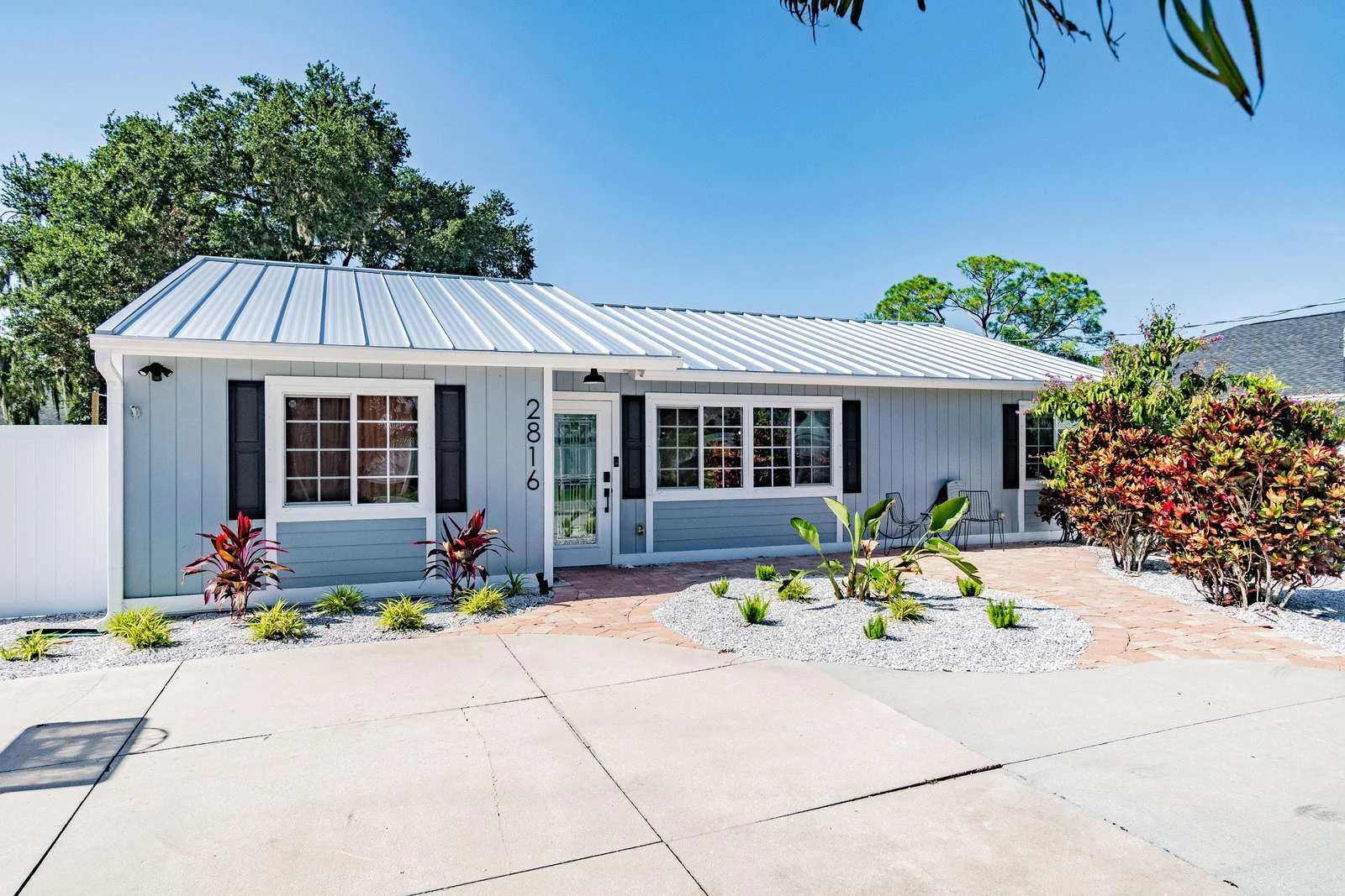 Front exterior and driveway parking